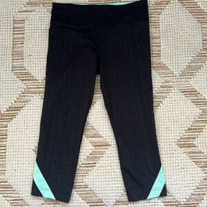 Under Armour leggings snake embossed black with turquoise accents